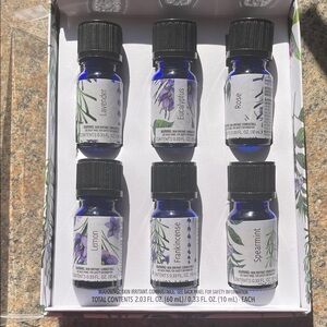 Set of Essential Oils in Blue Bottles